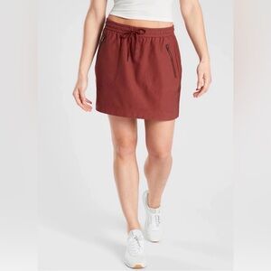 ATHLETA Rust Athletic Skirt Zip Pockets Drawstring Waist | Size 8